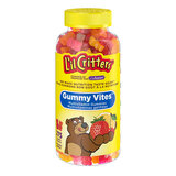 Front on shot of gummy vitamins in plastic jar with yellow label