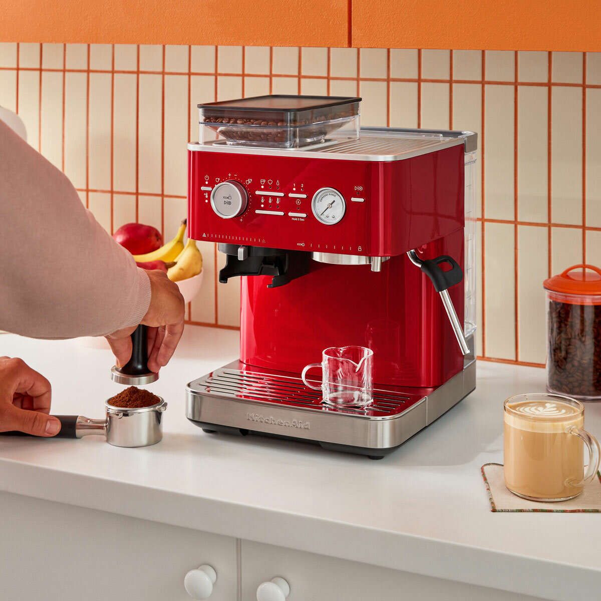 Lifestyle image of KitchenAid Semi Auto Espresso Machine & Burr Grinder showing grinded coffee Lifestyle image of KitchenAid Semi Auto Espresso Machine & Burr Grinder showing grinded coffee