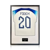 Phil Foden Signed Framed 2024 England Football Shirt with White Mount Phil Foden Signed Framed 2024 England Football Shirt with White Mount