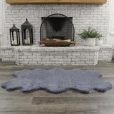 Mon Chateau faux fur rug in grey