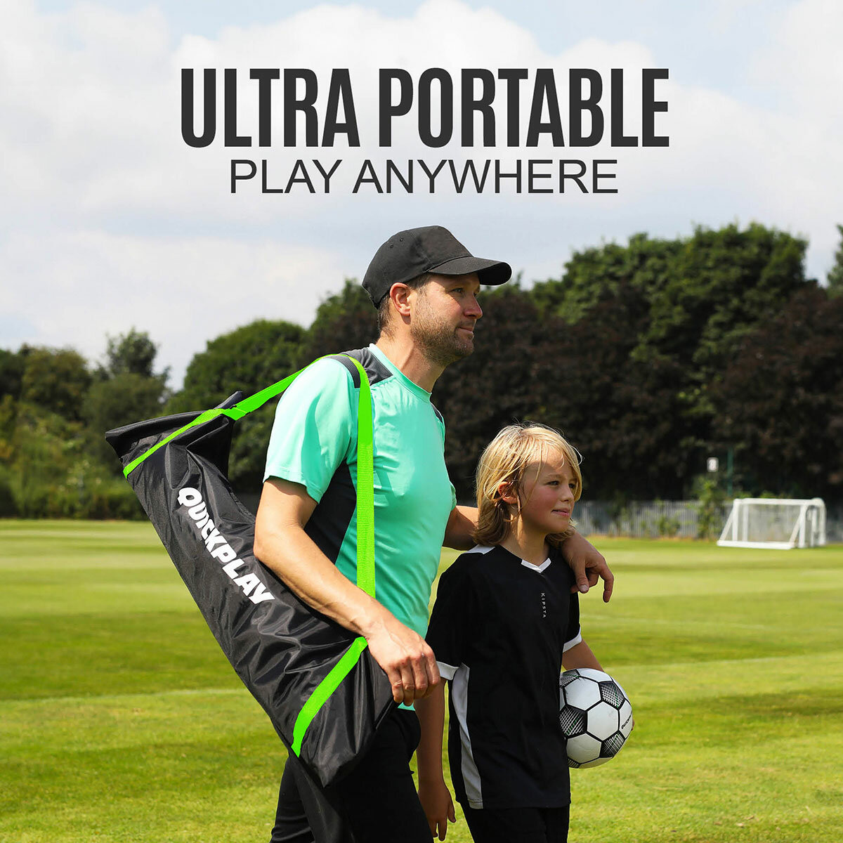 Lifestyle image of a man carrying the goal in the bag, his arm on the shoulder of a child walking next to him with the football Lifestyle image of a man carrying the goal in the bag, his arm on the shoulder of a child walking next to him with the football