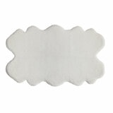 Layout image of Ivory faux fur quad rug