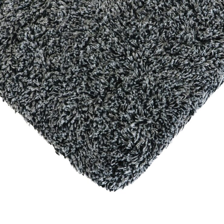 Close up image of corner of mat on white background Close up image of corner of mat on white background