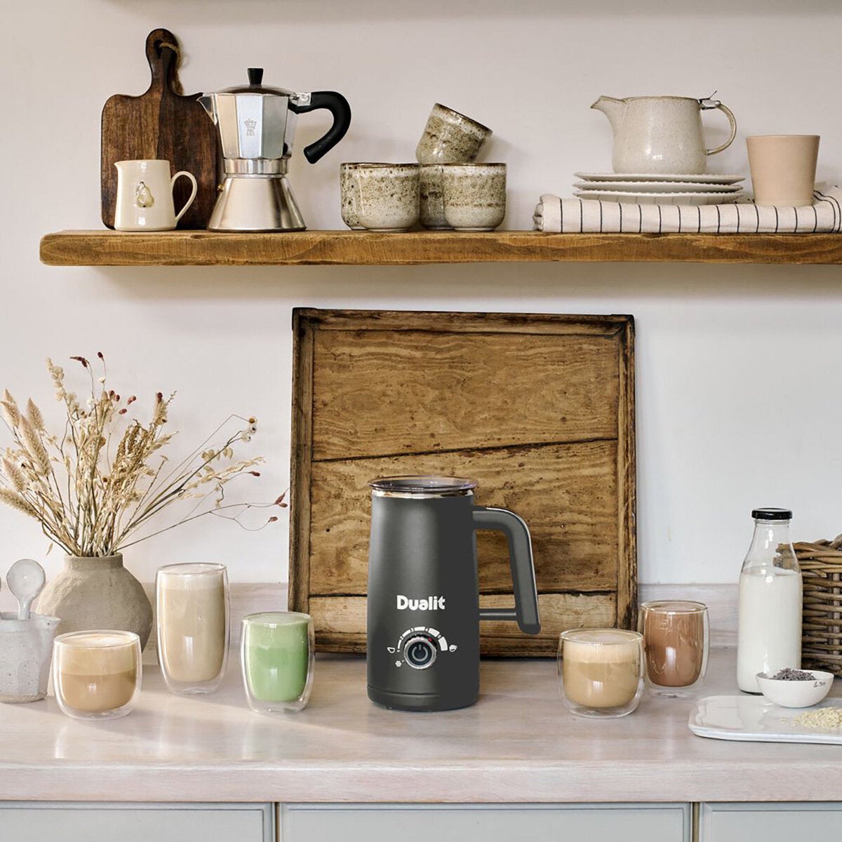 life style image of milk frother and hot chocolate maker on kitchen countertop life style image of milk frother and hot chocolate maker on kitchen countertop