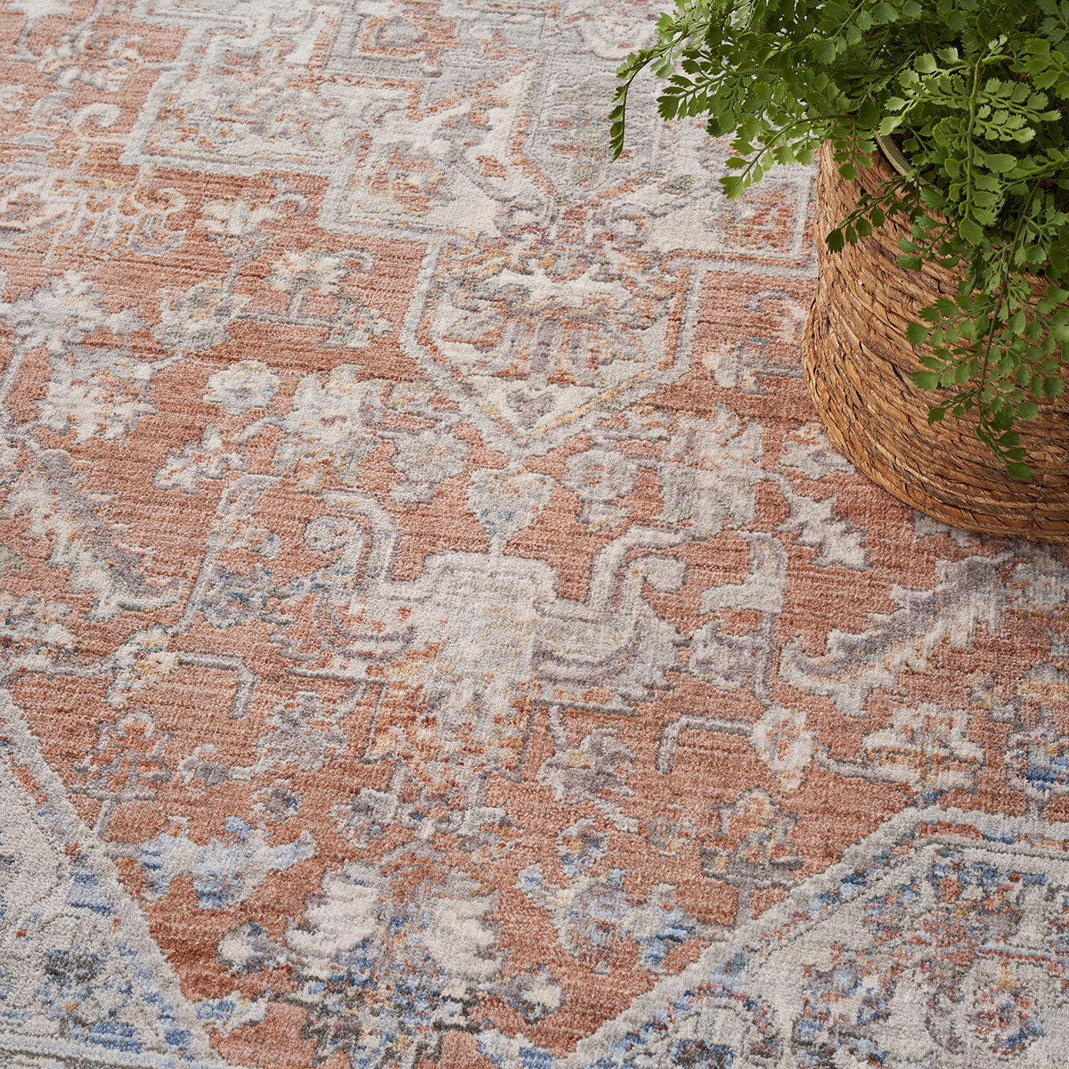 Elegant heirloom rug, tradtional design in rust, grey, blue and ivory tones