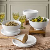 lifestyle image of bowls with plates and lids