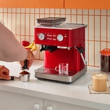 Lifestyle image of KitchenAid Semi Auto Espresso Machine & Burr Grinder showing grinded coffee Lifestyle image of KitchenAid Semi Auto Espresso Machine & Burr Grinder showing grinded coffee