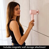 Lifestyle image of model using magnetic wall storage attachment