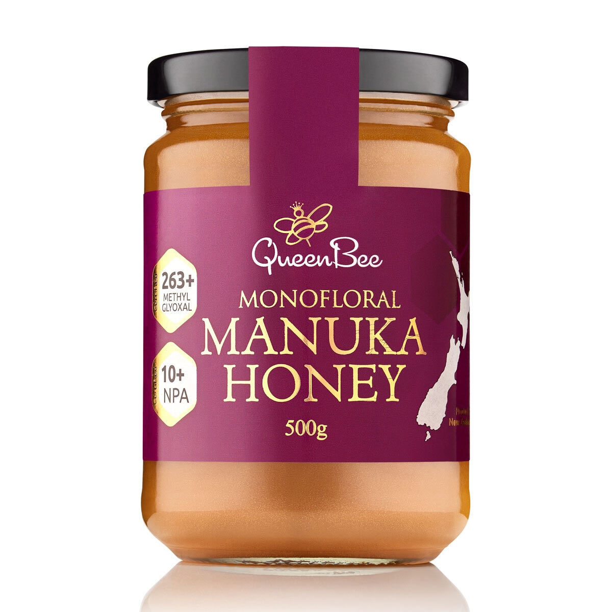 glass jar of honey with purple label
