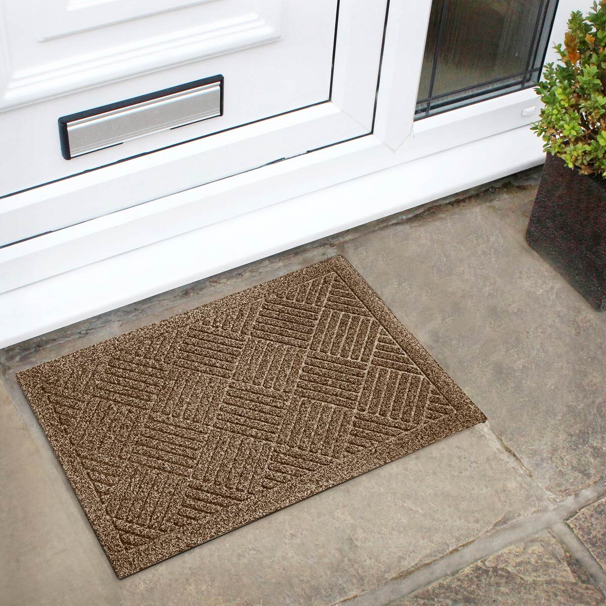 Lifestyle image of mat outside front door