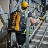 Lifestyle image of backpack beng worn on construction site