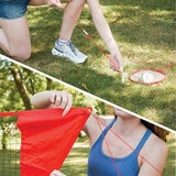 Lifestyle image showing a woman attaching the net to ground stakes for stability
