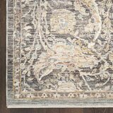 Grey and beige rug with detailed symmetrical pattern and vintage-style accents Grey and beige rug with detailed symmetrical pattern and vintage-style accents
