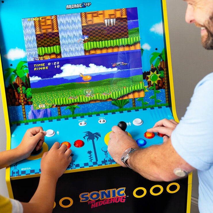 Lifestyle image of a man and child playing on the machine