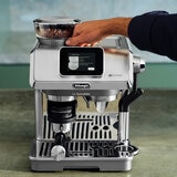 Lifestyle images of De'Longhi La Specialista Touch Coffee Machine on a kitchen countertop