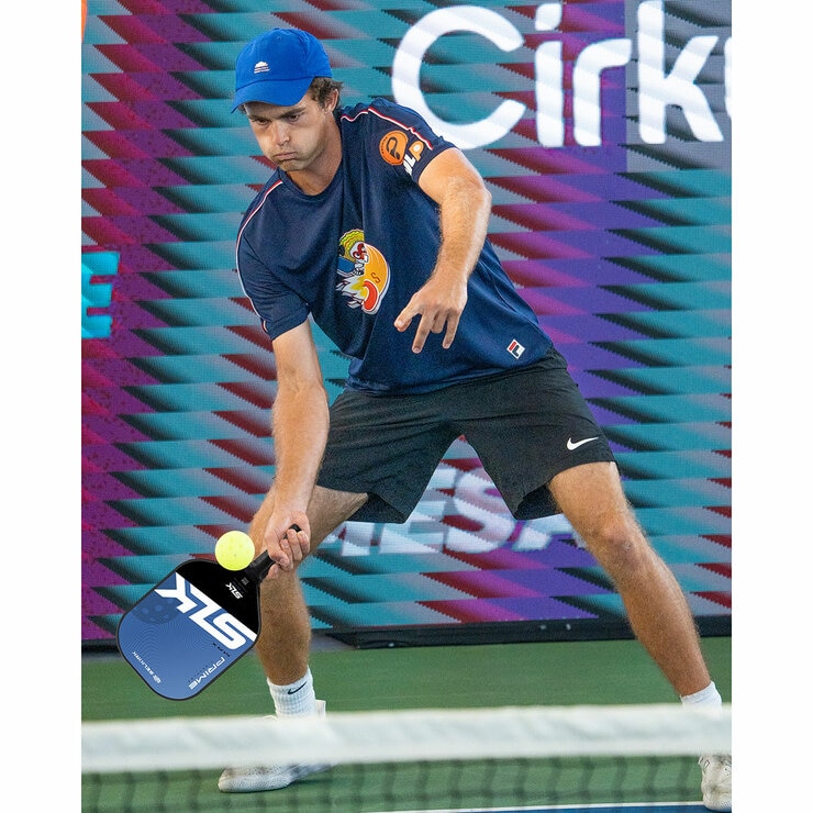 Lifestyle image of a person playing pickleball
