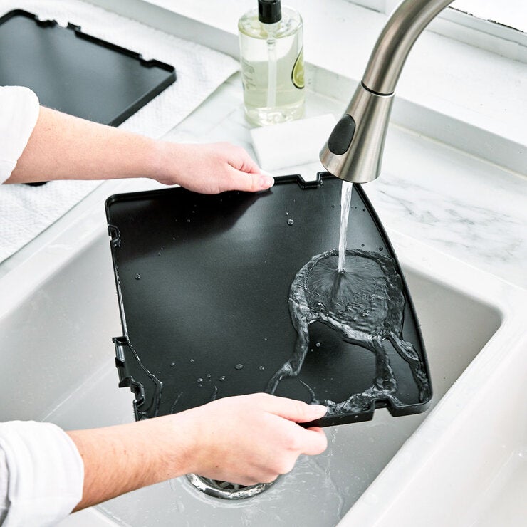 Close image of Greenpan contact grill plates under tap Close image of Greenpan contact grill plates under tap