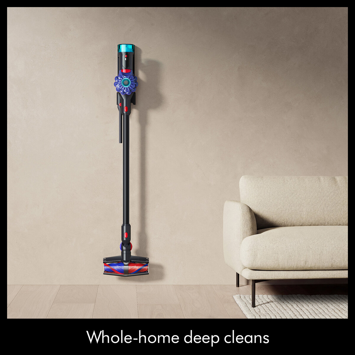 Lifestyle image showing stick vacuum in living room Lifestyle image showing stick vacuum in living room