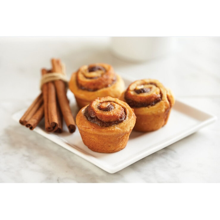 more rolls on another plate with box in the background