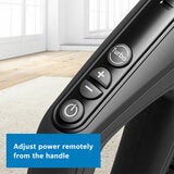 Lifestyle image showing adjusting power remotely from the handle Lifestyle image showing adjusting power remotely from the handle