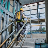 Lifestyle image of backpack beng worn on construction site