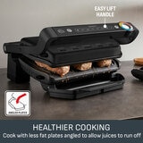 Lifestyle image of Tefal Oprigrill with angled plates to allow juices to run off