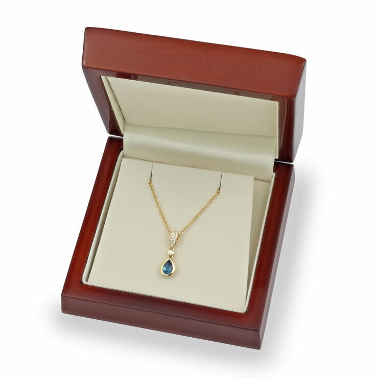 Pear Cut Blue Topaz & 0.07ctw Diamond Pendant, 18ct Yellow Gold