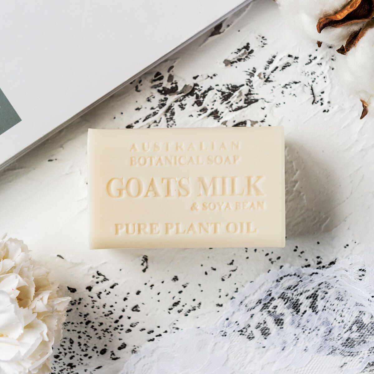 Soap Bar on a Table with White Flowers