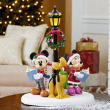 Buy Disney Christmas Caroler TableTop Lifestyle Image at Costco.co.uk