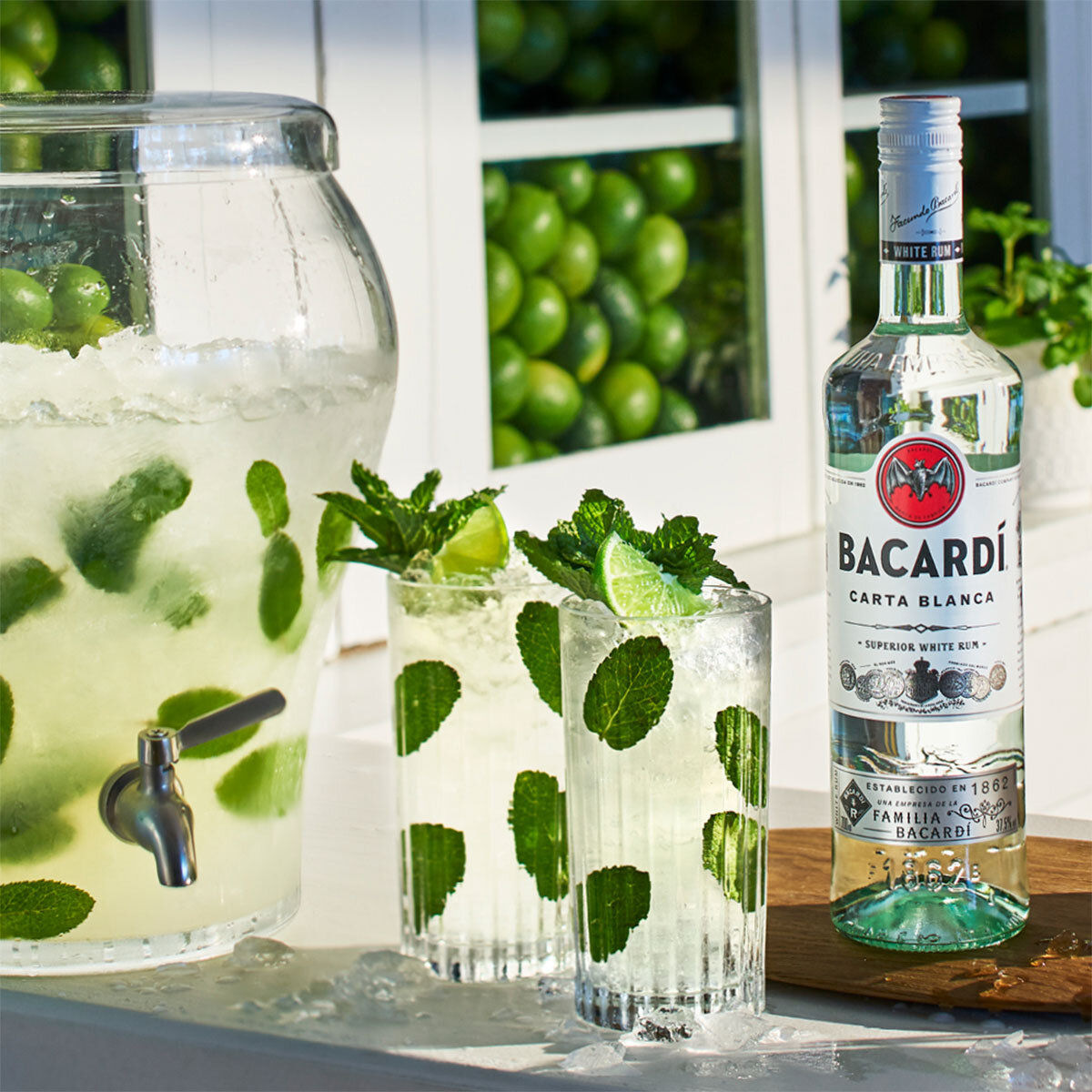 Bacardi Carta Blanca Rum, with 2 glasses and a jug