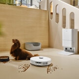 Lifestyle image of MOVA E30 Ultra Robot Vacuum cleaning pet food