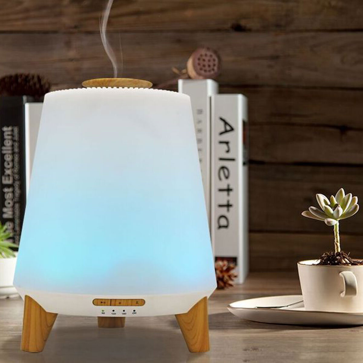 Lifestyle image of Vybra Atmos Diffuser in blue