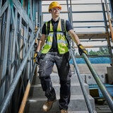 Lifestyle image of backpack beng worn on construction site