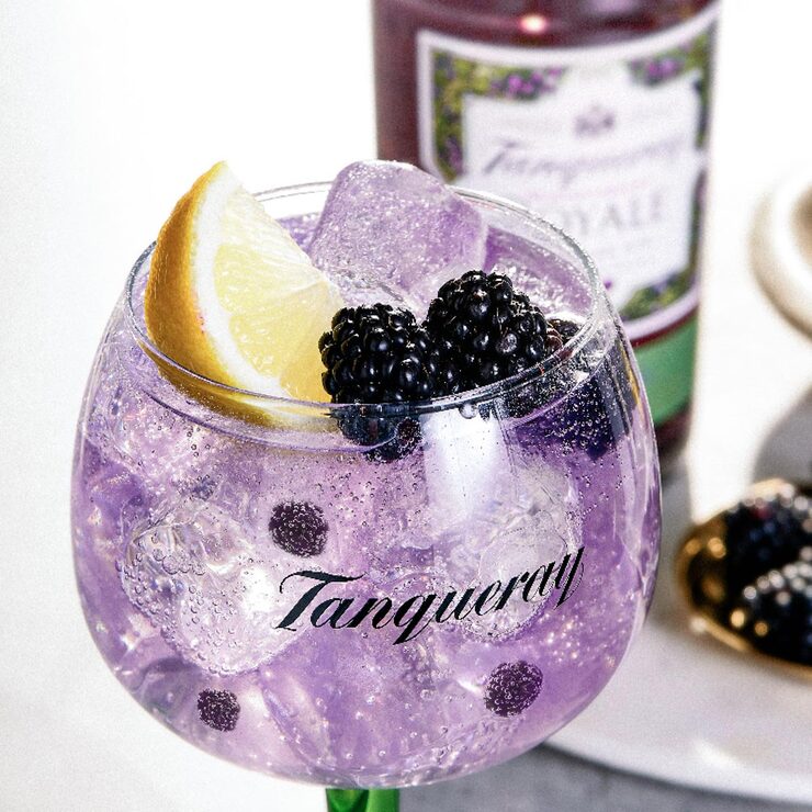 Lifestyle image of cocktail in balloon glass