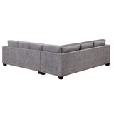 Cut out image of corner sofa from behind on white background
