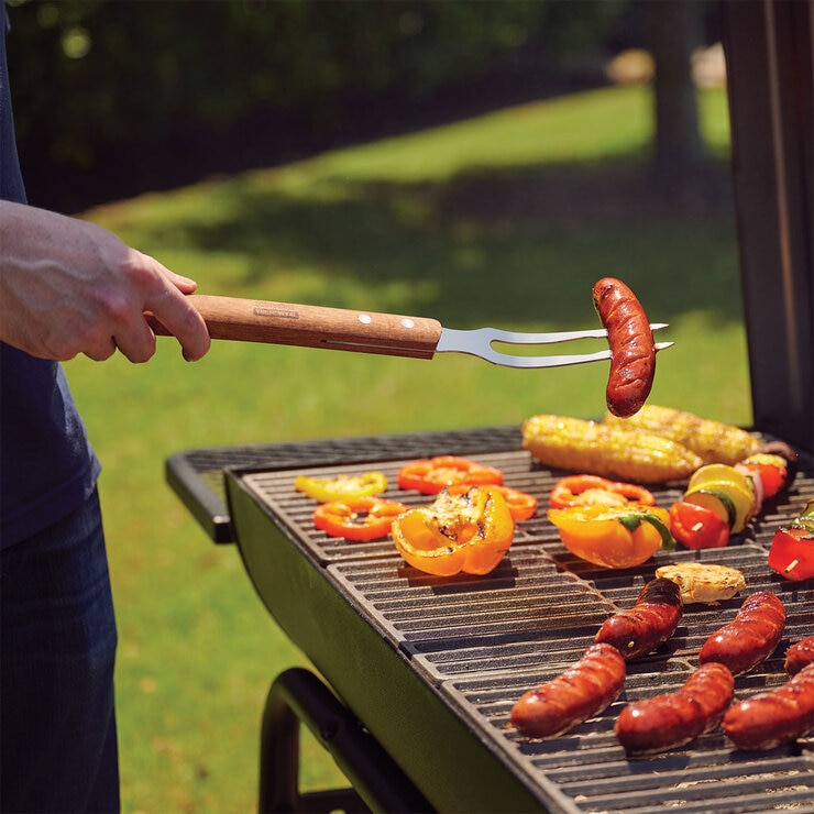 Lifestyle image of fork utensil on bbq