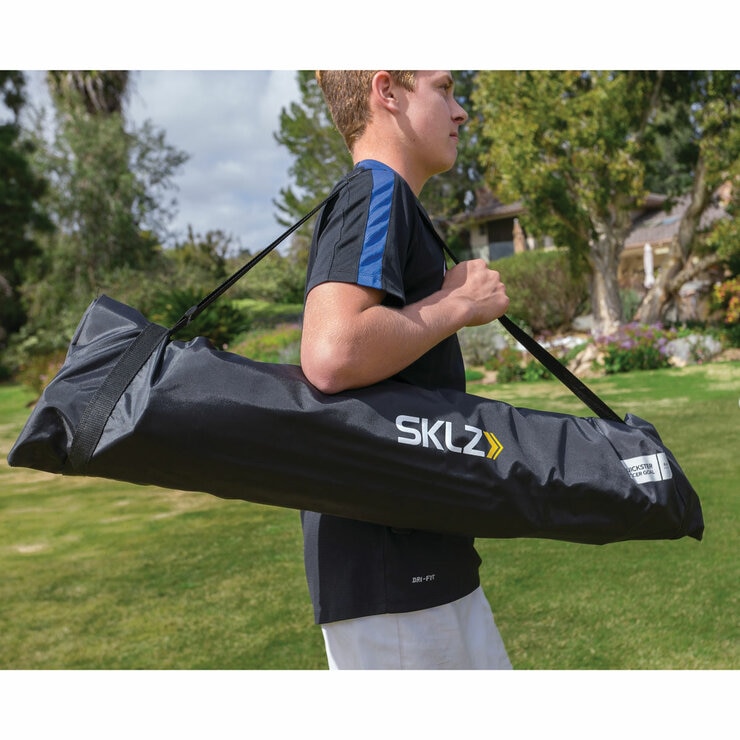 Lifestyle image of someone carrying the storage bag