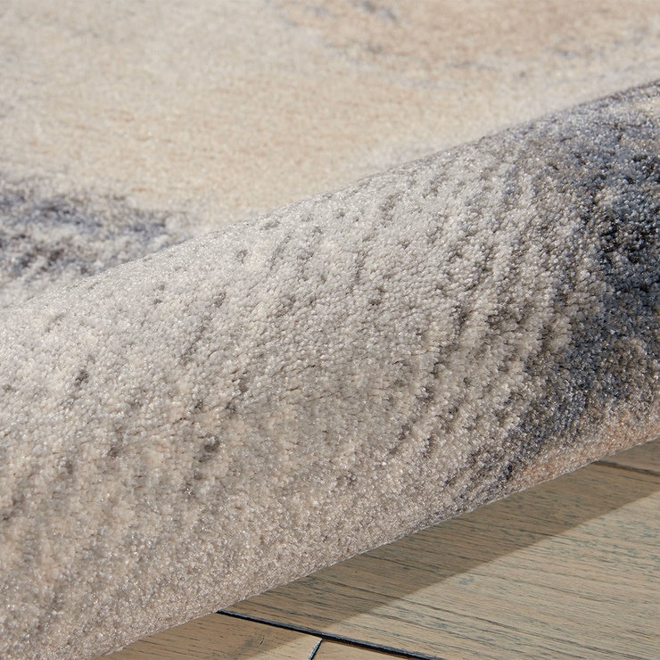 Close up of rolled rug, showing pile depth Close up of rolled rug, showing pile depth