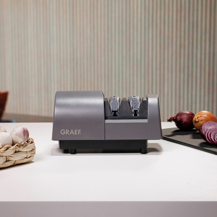 Lifestyle image of GRAEF knife sharpener on kitchen counter top Lifestyle image of GRAEF knife sharpener on kitchen counter top
