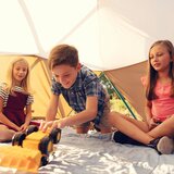 Lifestyle image showing children playing with a toy truck under the Dome Climber Lifestyle image showing children playing with a toy truck under the Dome Climber