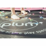 Lifestyle image of the Plum logo on the trampoline
