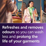 Image of Philips Handheld Steamer describing how it refreshes clothing