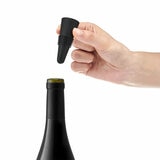 Lifestyle image of wine stopper attachment being used