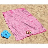 Pink Princess character beach towel laid out on sand