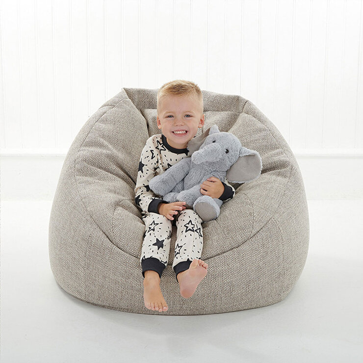 Boy Sitting Down Cuddling Elephant Boy Sitting Down Cuddling Elephant