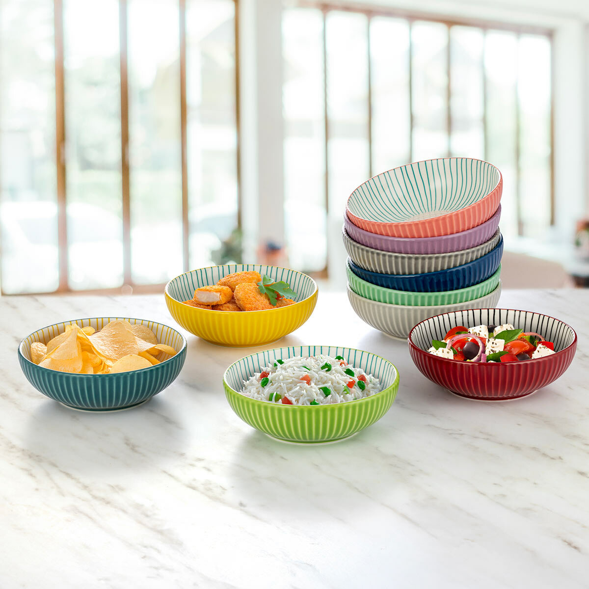 signature houseware stoneware bowls with food on kitchen counter
