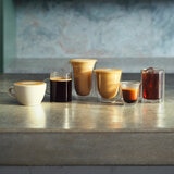 Lifestyle images of various coffess made on a kitchen countertop