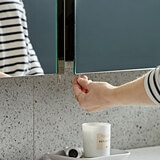 Lifestyle image of mirrored cabinet in bathroom setting