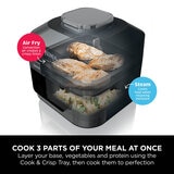 Lifestyle image showing meal being cooked in 3 parts in the multi cooker Lifestyle image showing meal being cooked in 3 parts in the multi cooker