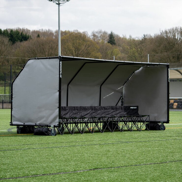 Lifestyle image of the Quickplay Pro Alu Club Shelter 16 x 6ft with chairs underneath (not included) Lifestyle image of the Quickplay Pro Alu Club Shelter 16 x 6ft with chairs underneath (not included)